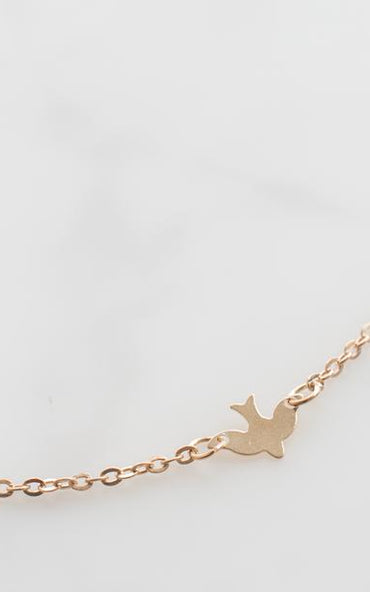 Gold Bird Necklace
